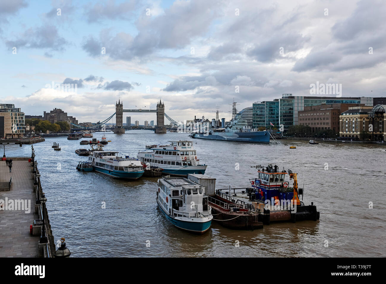 London's iconic Tower Bridge viewed from a terrace overlooking the River Thames, London, England, UK. Stock Photo