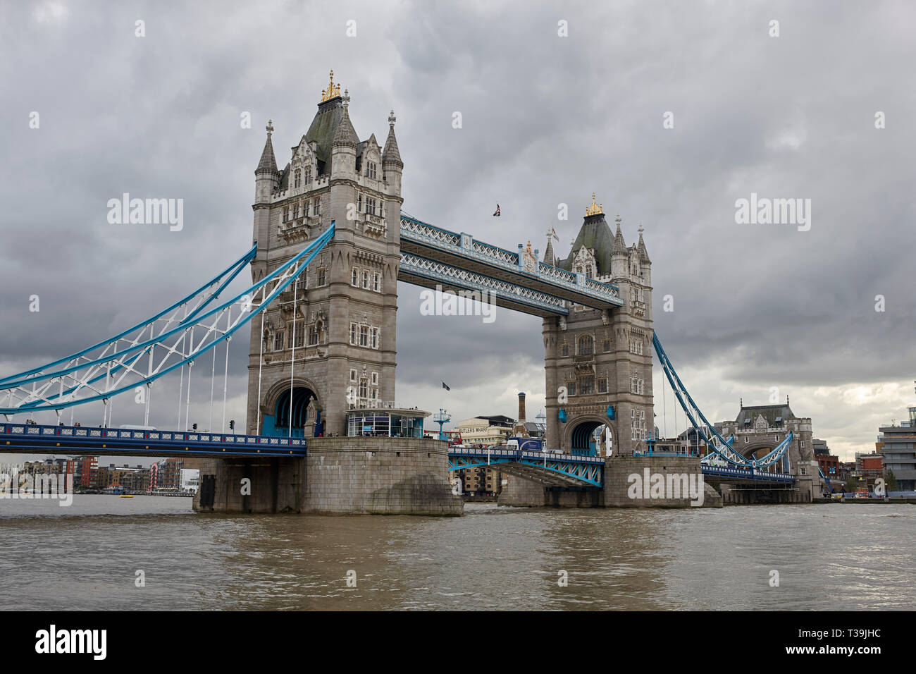 London's iconic Tower Bridge on an overcast day, viewed from the Tower of London on the north bank of the River Thames, London, England, UK. Stock Photo