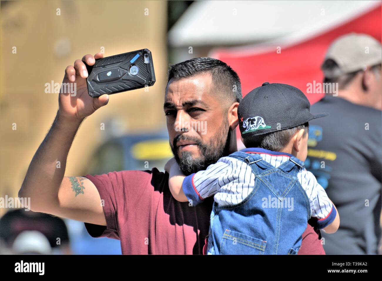 People who are real are using cell phones for making photo images at