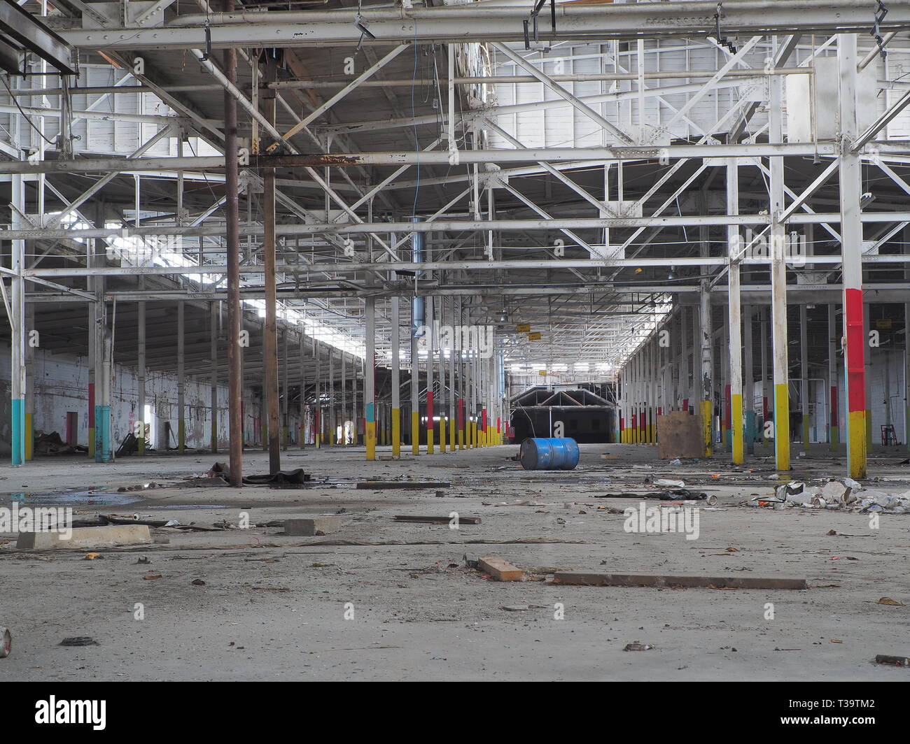 Inside of a abandoned auto factory Stock Photo