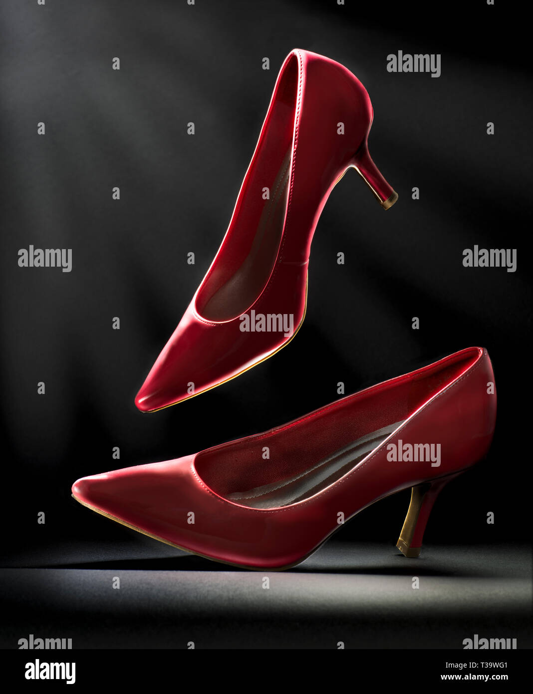Pair of red highheel shoes "dancing Stock Photo Alamy