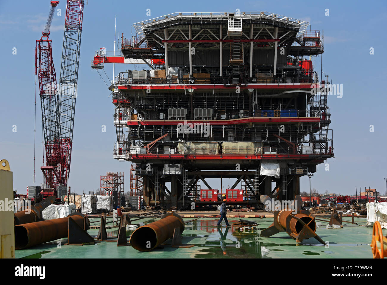 Construction and building of the wellhead of the oil rig platform for Lukoil Filanovsky field development project in the Caspian sea in Russia. Stock Photo