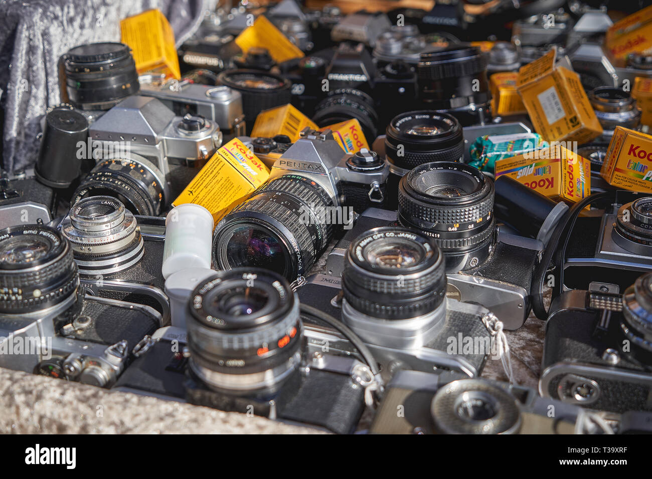 London, UK - November, 2018. Old Vintage cameras and lenses on sale in a stall in Portobello Road Market, the largest antiques market in the world. Stock Photo