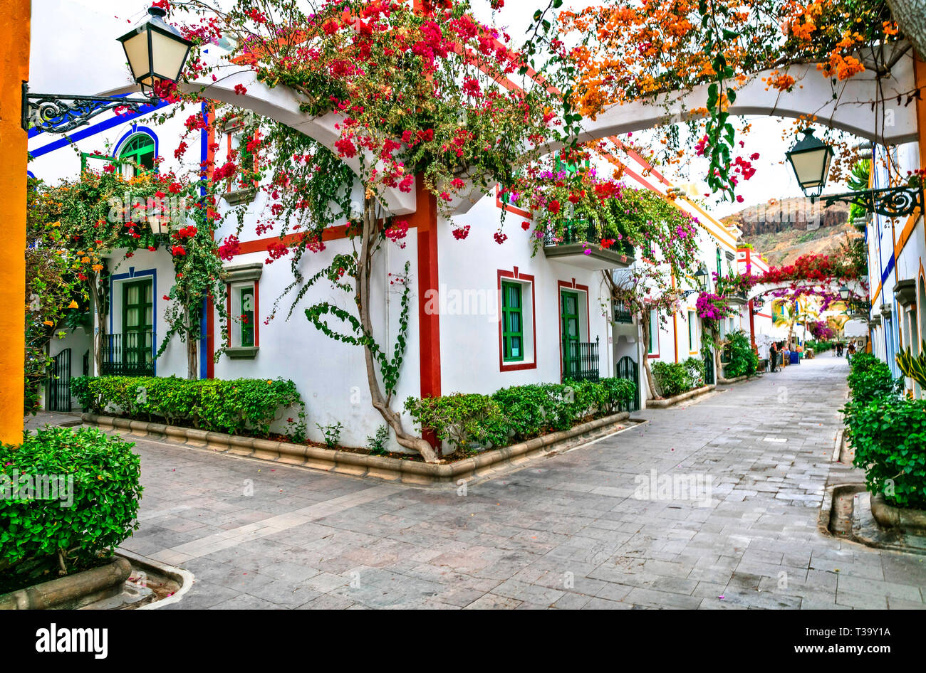 Old strreets of Puerto de Mogan,view with traditional houses and flowers,Gran Canaria,Spain. Stock Photo