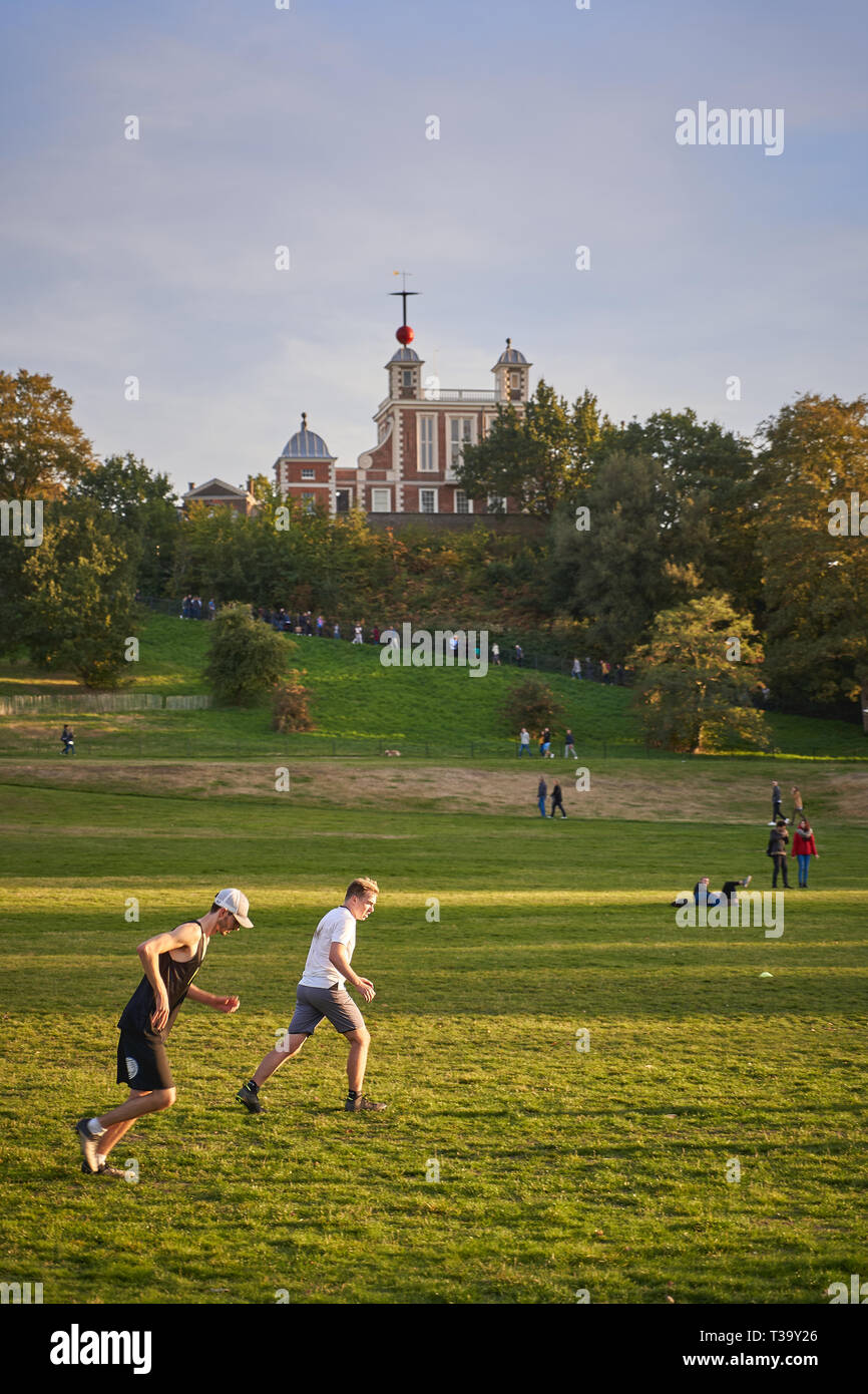 People practicing sport in Greenwich Park. Portrait format. Stock Photo