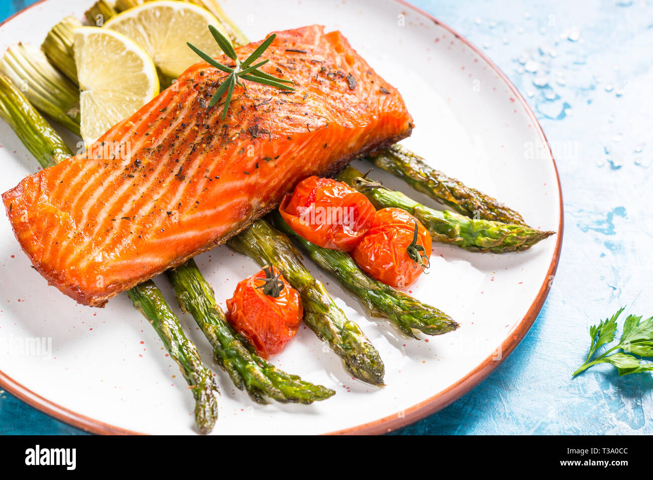 Grilled salmon fish fillet with asparagus Stock Photo - Alamy