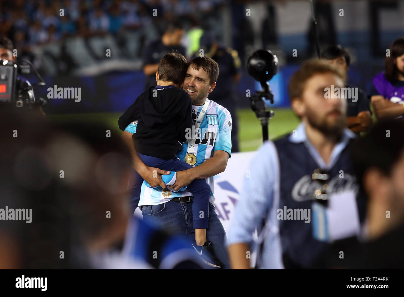 Buenos Aires, Argentina - April 07, 2019: Eduardo Coudet (DT Racing) with his son celebrating the championship in the Juan Domingo Peron Stadium in Bu Stock Photo