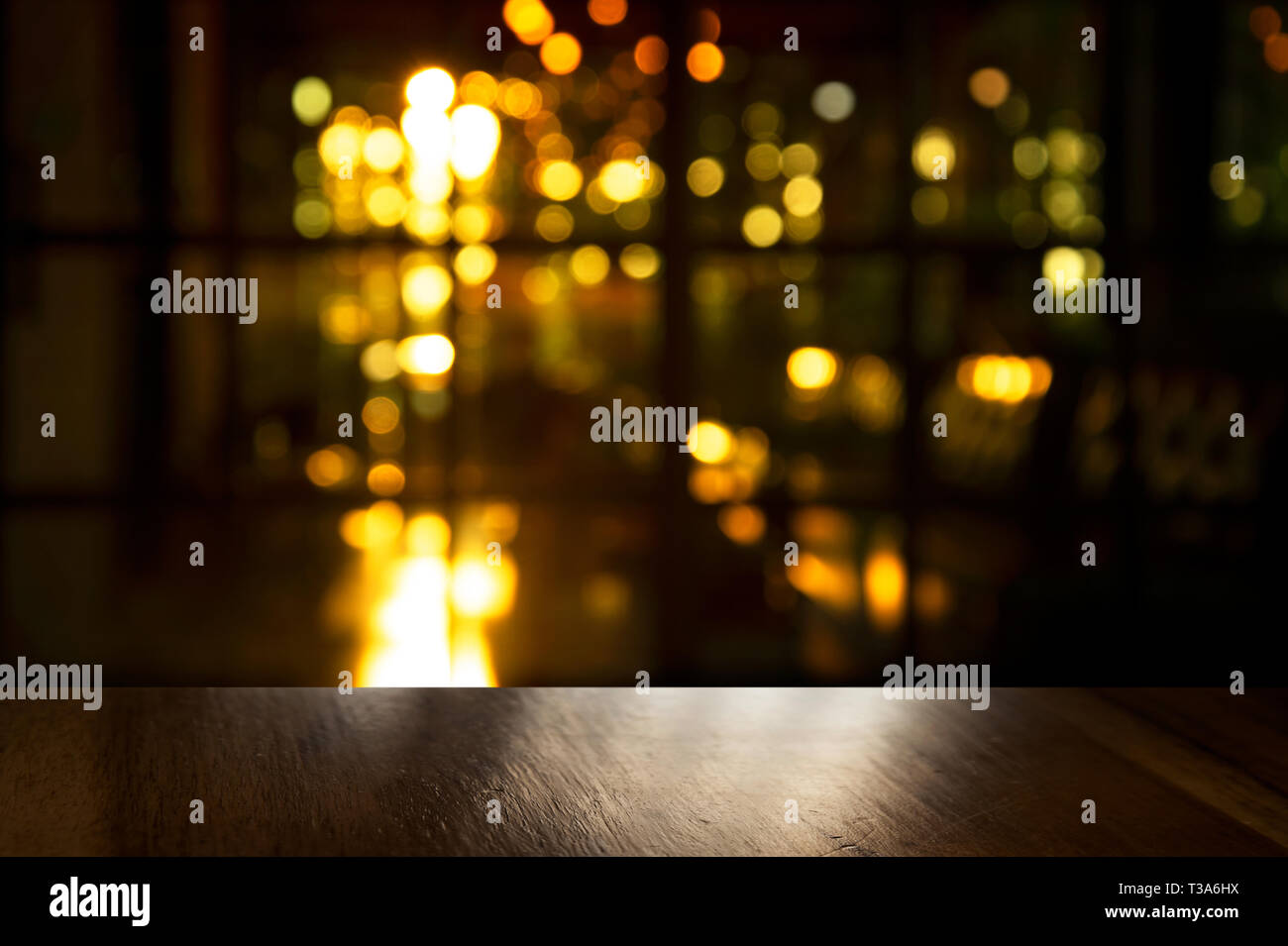 top of black wood table with blur light of party in bar or pub in the dark  night background Stock Photo - Alamy