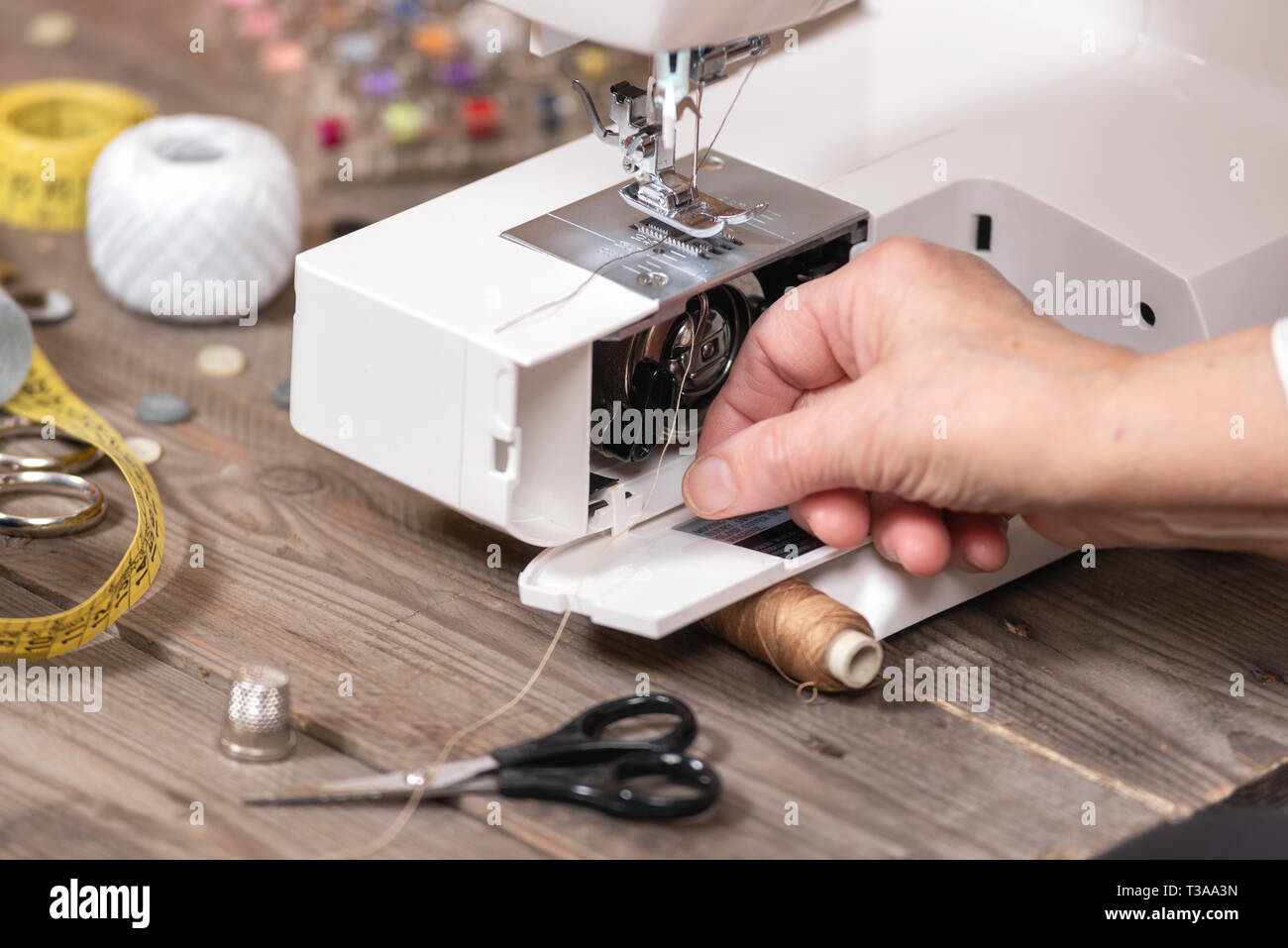 Sewing machine bobbin case hi-res stock photography and images - Alamy