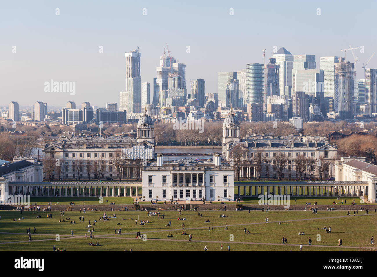View of Canary Wharf from a hill in Greenwich Park, London. Stock Photo