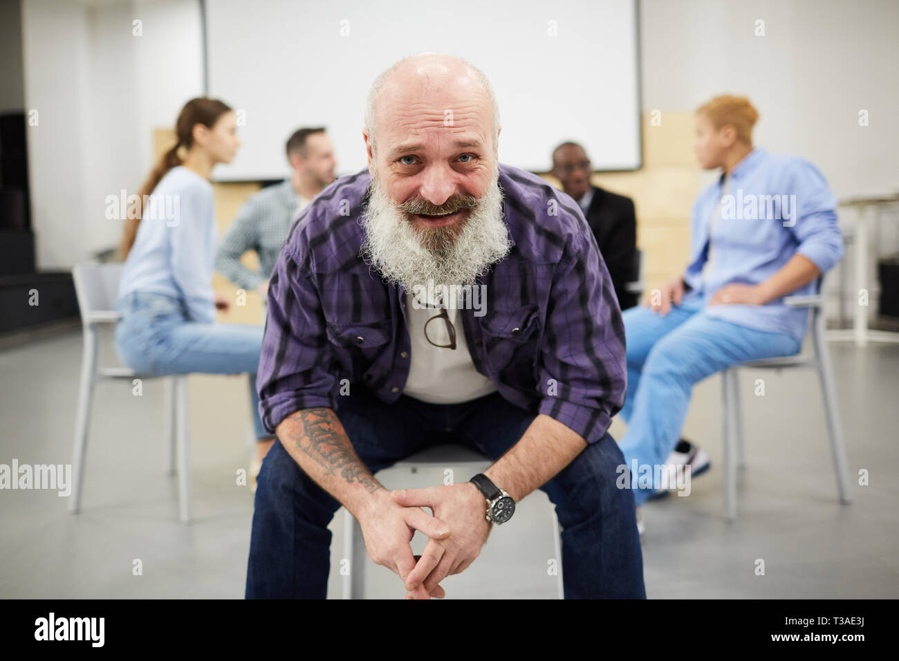 Smiling Senior Man in therapy Session Stock Photo