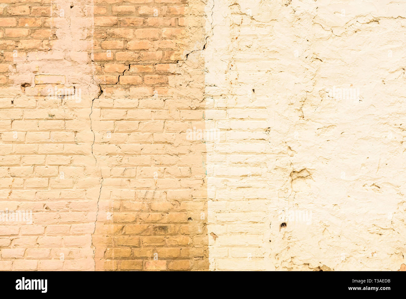 Texture of a brick wall painted in orange tones, ideal for background ...