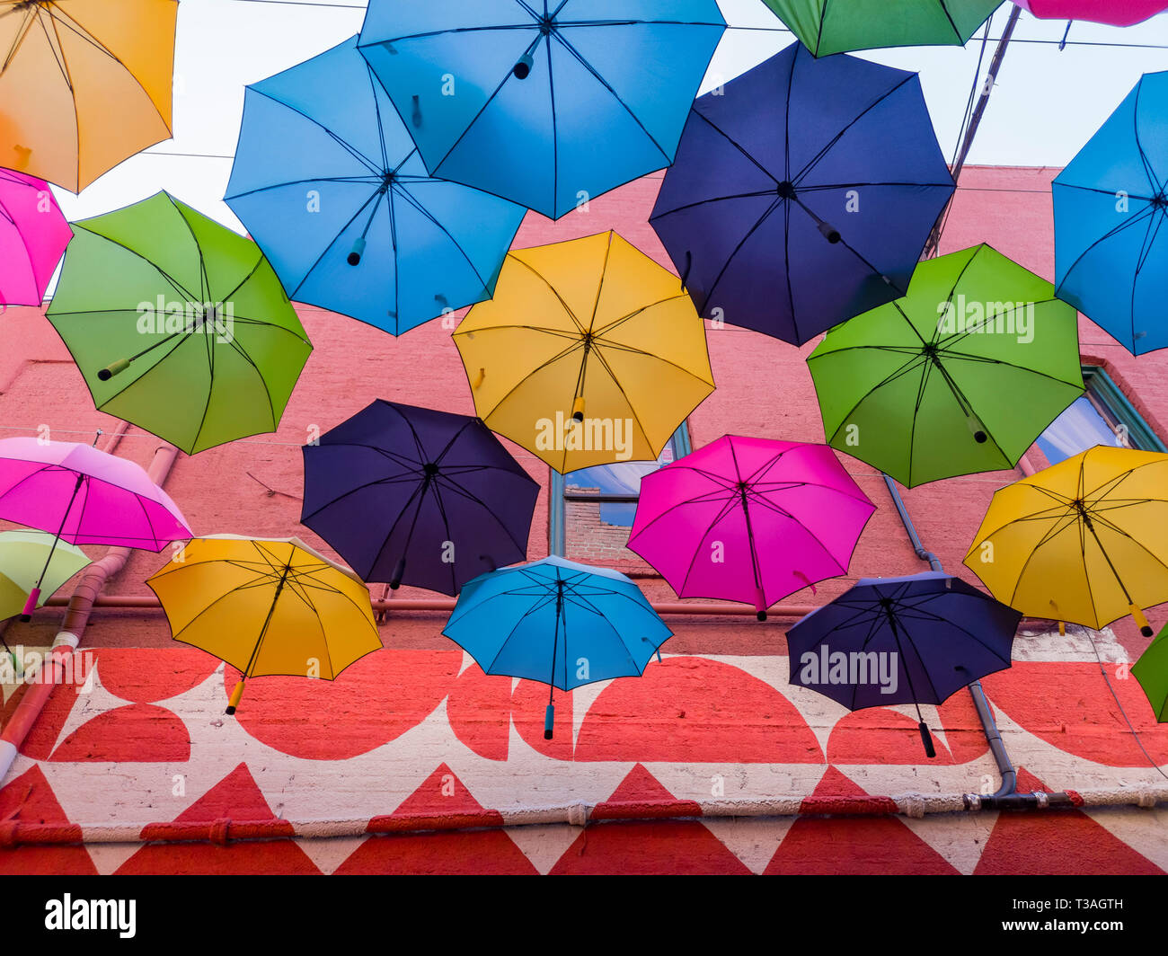 Colorful umbrellas hanging in the famous Orange Street Alley at
