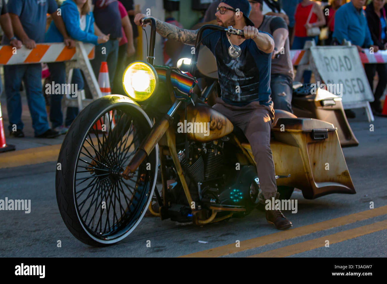 Daytona Beach, FL - 12 March 2016: Biker on customized motorcycle participating in the 75th Annual Bike Week at the World's Most Famous Beach. Stock Photo