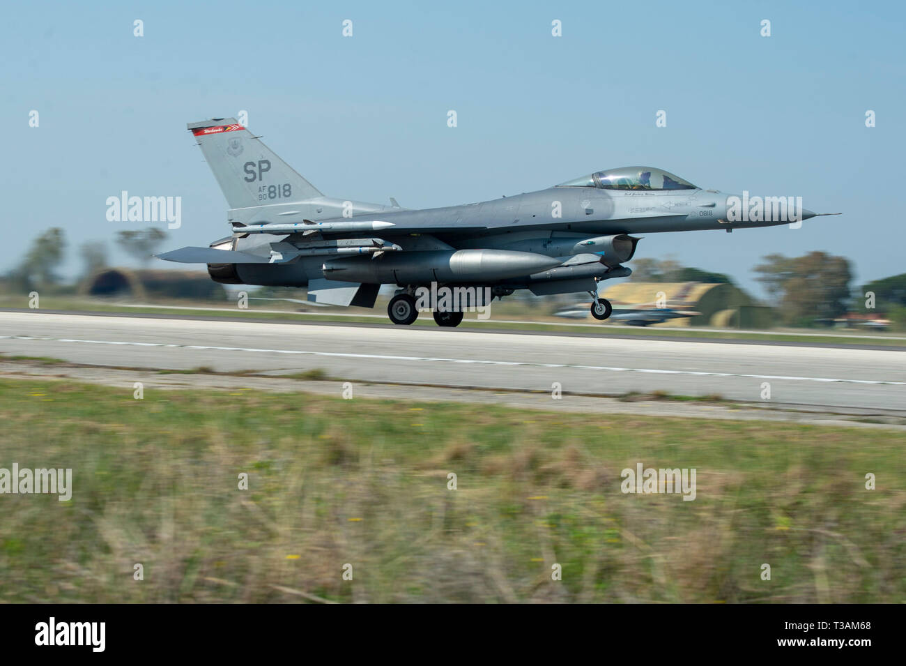 A U.S. Air Force F-16 Fighting Falcon assigned to the 480th Expeditionary Fighter Squadron takes off during exercise INIOCHOS 19 at Andravida Air Base, Greece, April 3, 2019. The 480th EFS participation helps to enhance interoperability and maintain joint readiness with the participating allies and partner nations. (U.S. Air Force photo by Airman 1st Class Branden Rae) Stock Photo