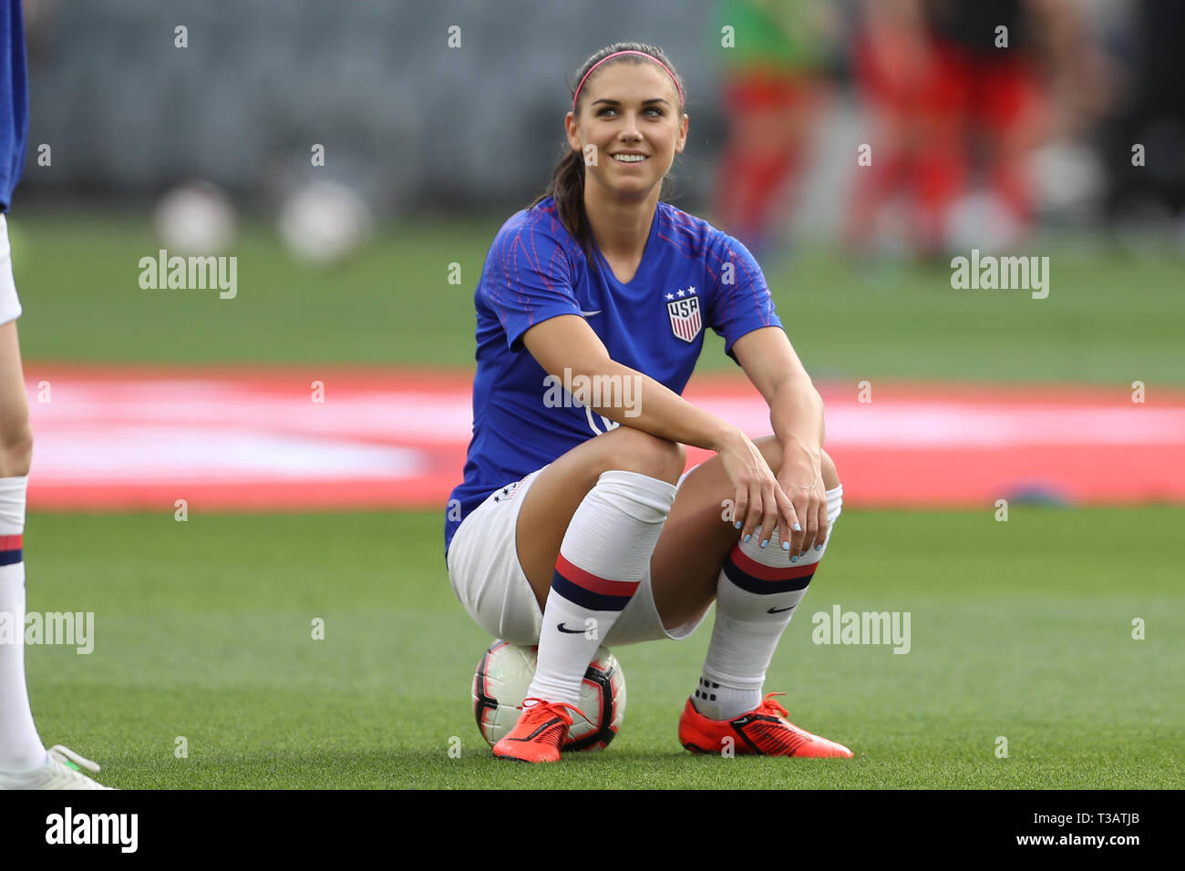 Los Angeles, CA, USA. 7th Apr, 2019. United States of America forward Alex Morgan (13) rests during pre-game warmups before the game between Belgium and USA at Banc of California Stadium in Los Angeles, CA. USA. (Photo by Peter Joneleit) Credit: csm/Alamy Live News Stock Photo