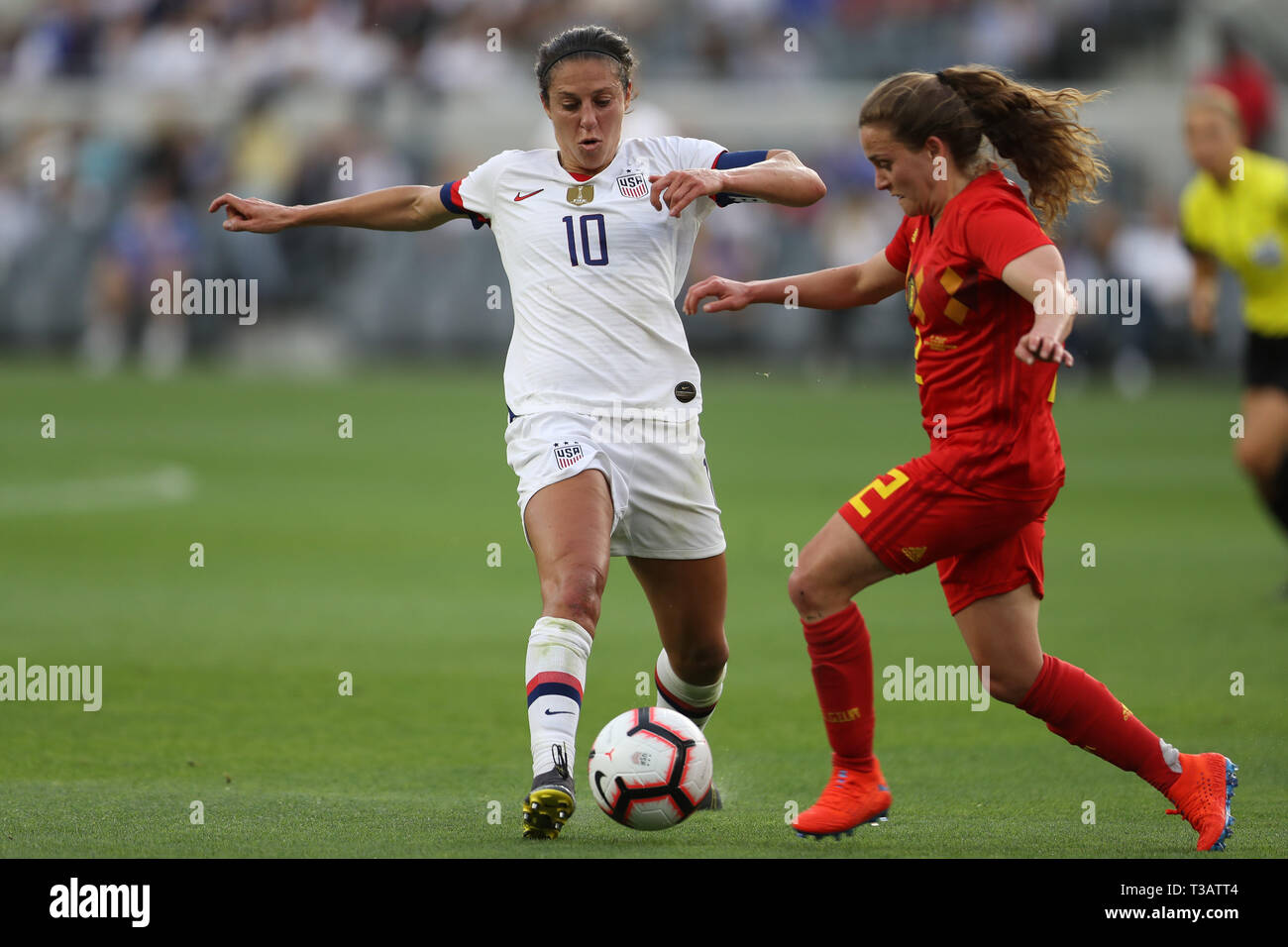 April 7, 2019:Belgium defender Davina Philtjens (2) kicks the ball away from United States of America midfielder Carli Lloyd (10) during the game between Belgium and USA at Banc of California Stadium in Los Angeles, CA. USA. (Photo by Peter Joneleit) Stock Photo