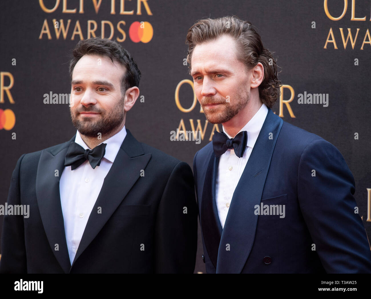 Charlie Cox and Tom Hiddleston attend The Olivier Awards 2019 with Mastercard at Royal Albert Hall. Stock Photo