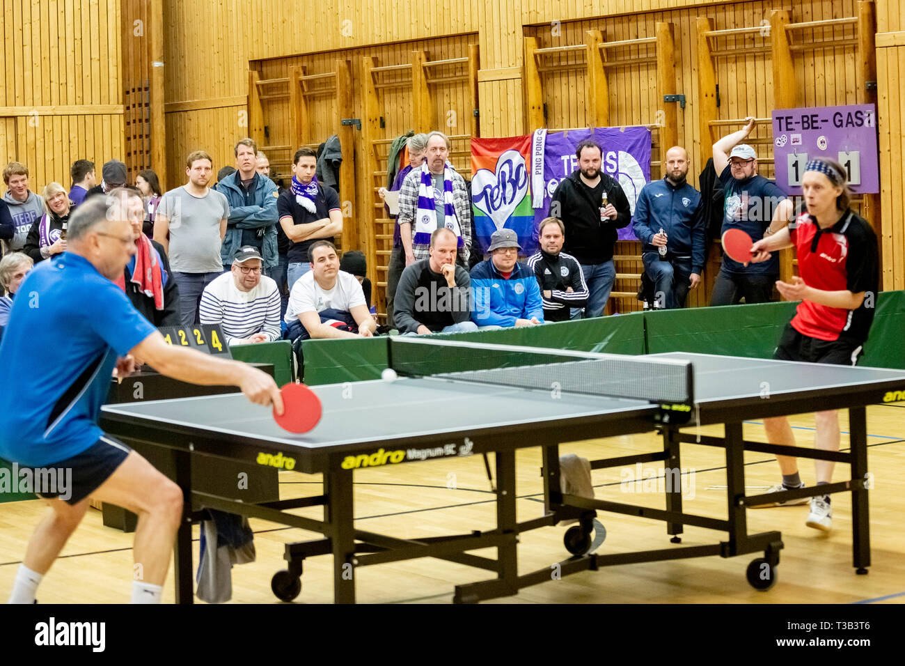 Berlin, Germany. 26th Mar, 2019. Soccer fans of Tennis Borussia Berlin (TeBe)  watch a table tennis game of the table tennis department of their club  against the Steglitzer Tischtennis Klub Berlin (STTK)