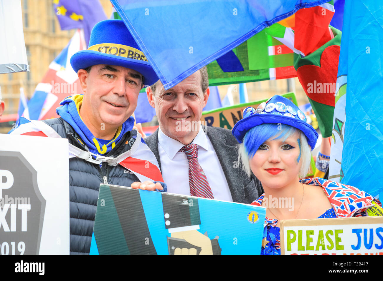 Westminster, UK, 08th April 2019. Alastair Campbell (middlel), Breit 'shouty man' Steven Bray (left) , activist Madeleine Kay (right) . Sodem, group of Anti-Brexit protesters outside the Houses of Parliament in Westminster have organised a 'Brexit Sing Off', and are joined by Yorkshire for Europe, opera singer Dame Sarah Connolly, journalist and former Labour Communications Director Alastair Campbell and others for a musical protest against Brexit. Credit: Imageplotter/Alamy Live News Stock Photo