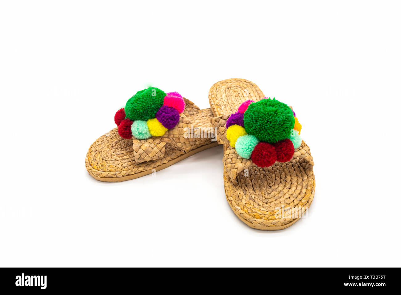 Sandals shoes handicraft made by water hyacinth on white background. Flip flops handmade. Stock Photo