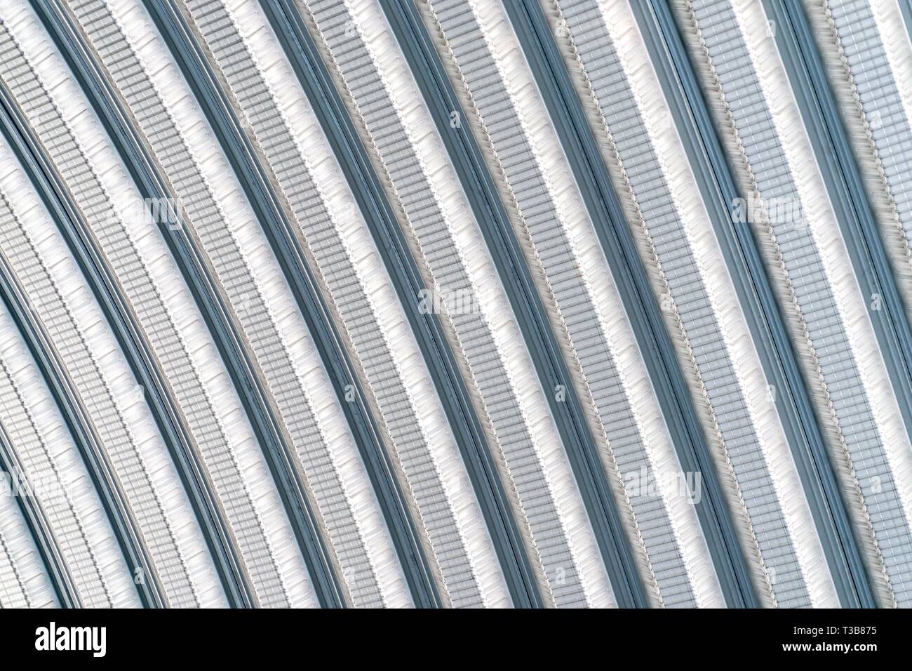 ceiling with the curve metal sheet block line design Stock Photo Alamy