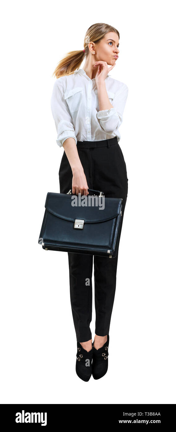 Young business woman jumping up in formal wear. Stock Photo