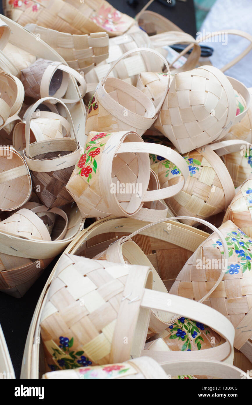 Many wicker baskets with handles made of wooden materials made by hand