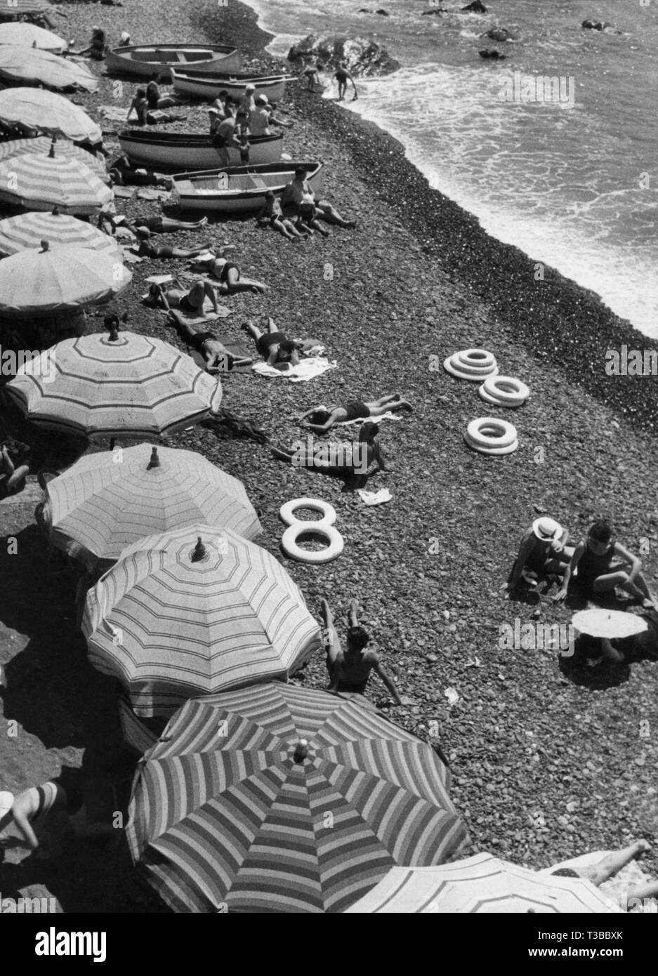 on the beach, 1950 Stock Photo