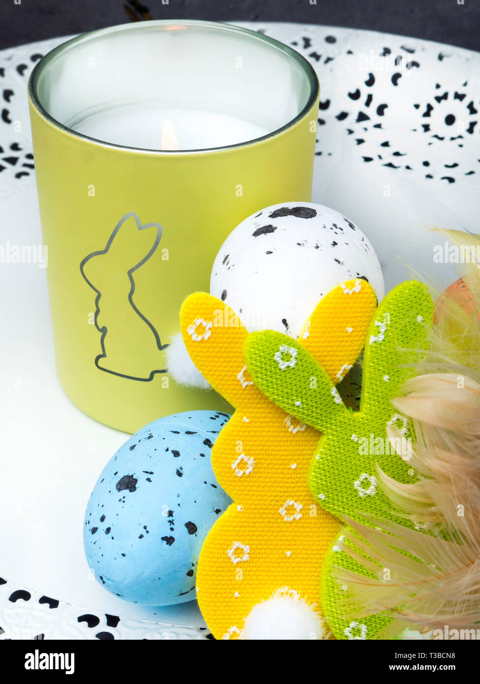 Easter decoration decorative bunny figure on candle, card with greeting ...