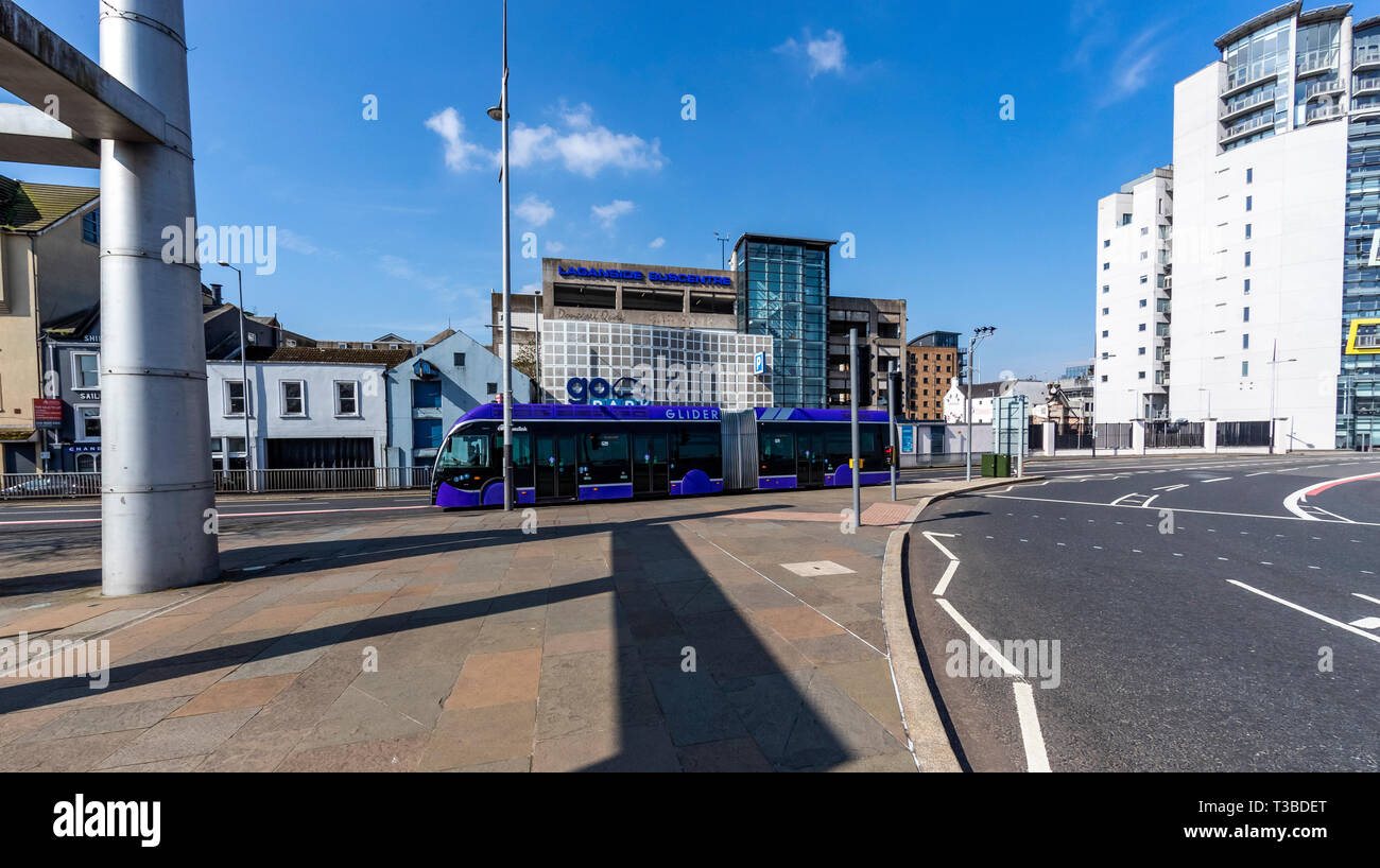 A Belfast Glider bus along Donegall Quay, Belfast, Northern Ireland
