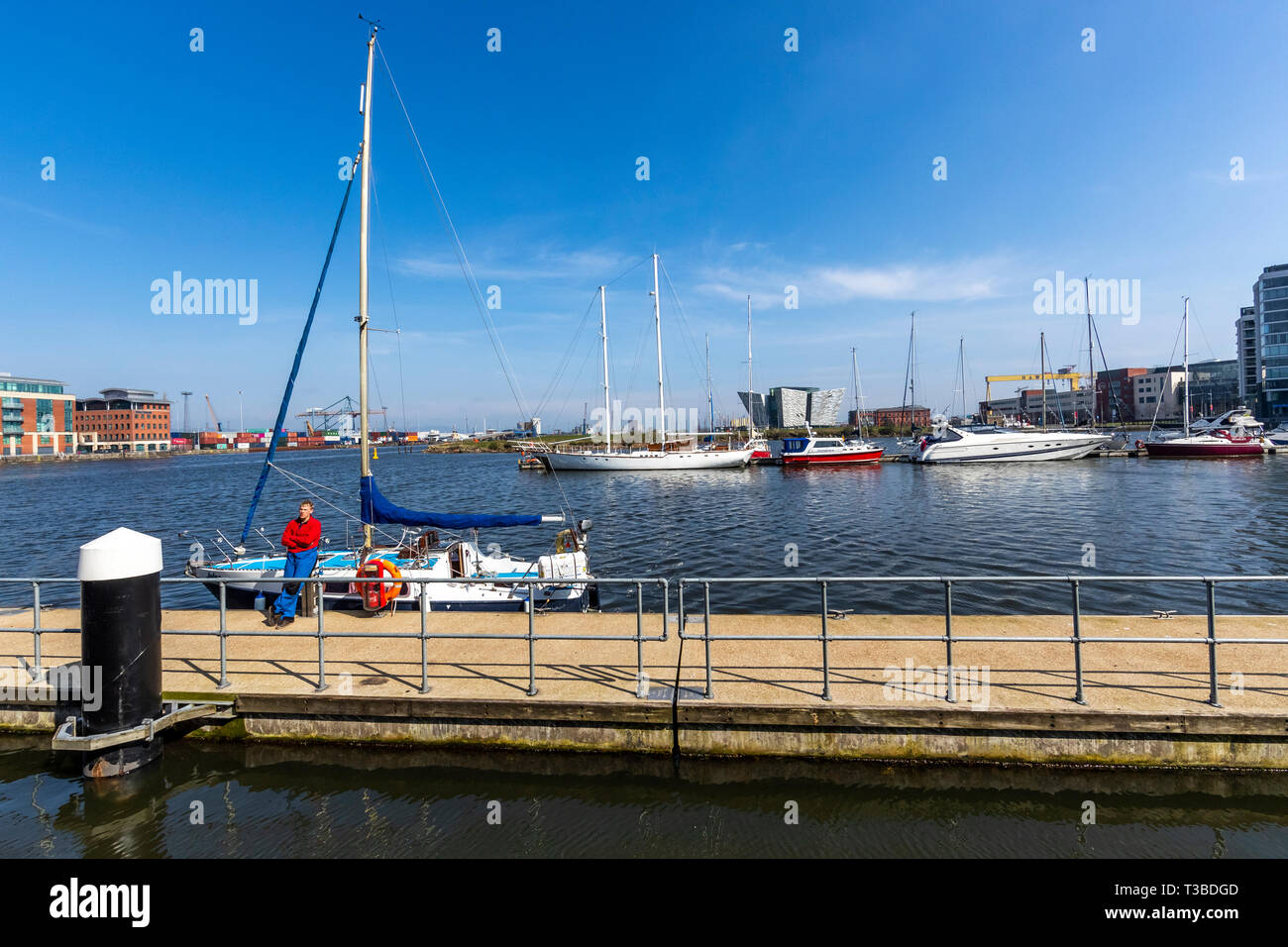 A Young Man Stands Beside His Own Yacht In Belfast Marina, Belfast 