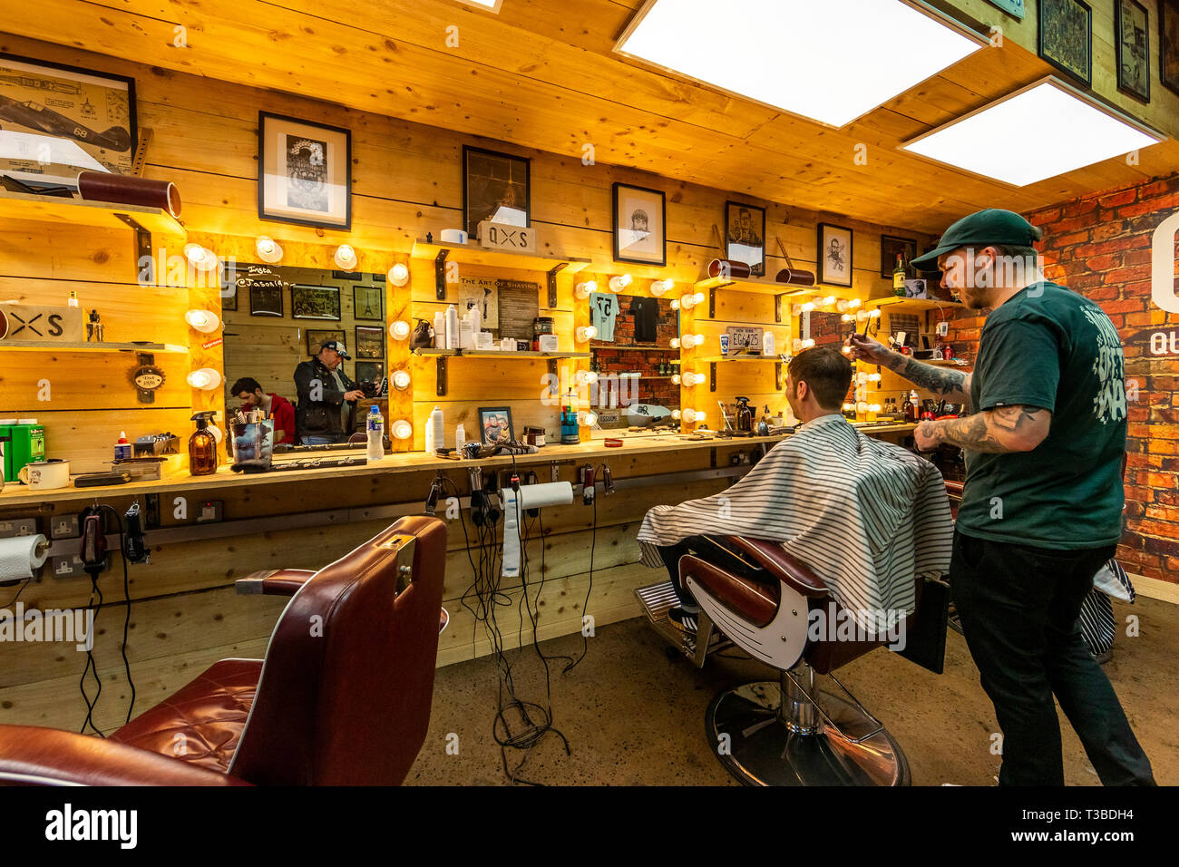 Style conscious men in Quarter West barbers shop in Pottinger