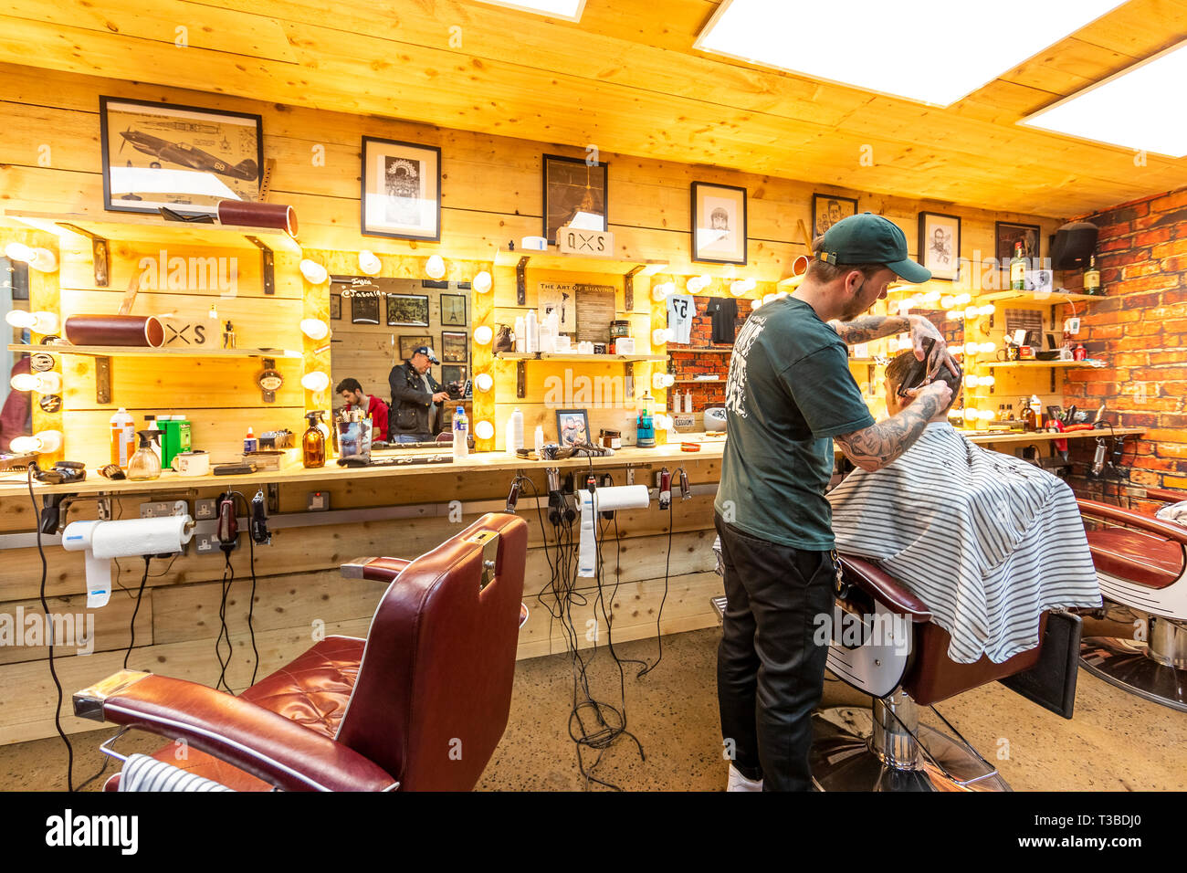 Style conscious men in Quarter West barbers shop in Pottinger