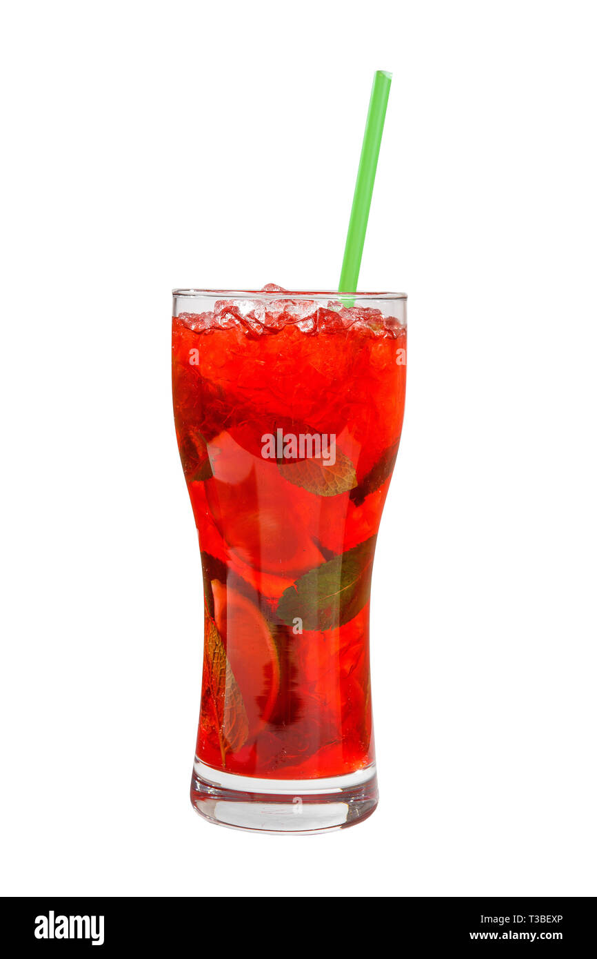 Red cocktail in a tall glass with fine ice and lemon, lime, mint leaves and green straw, Side view Isolated white background for the menu Stock Photo