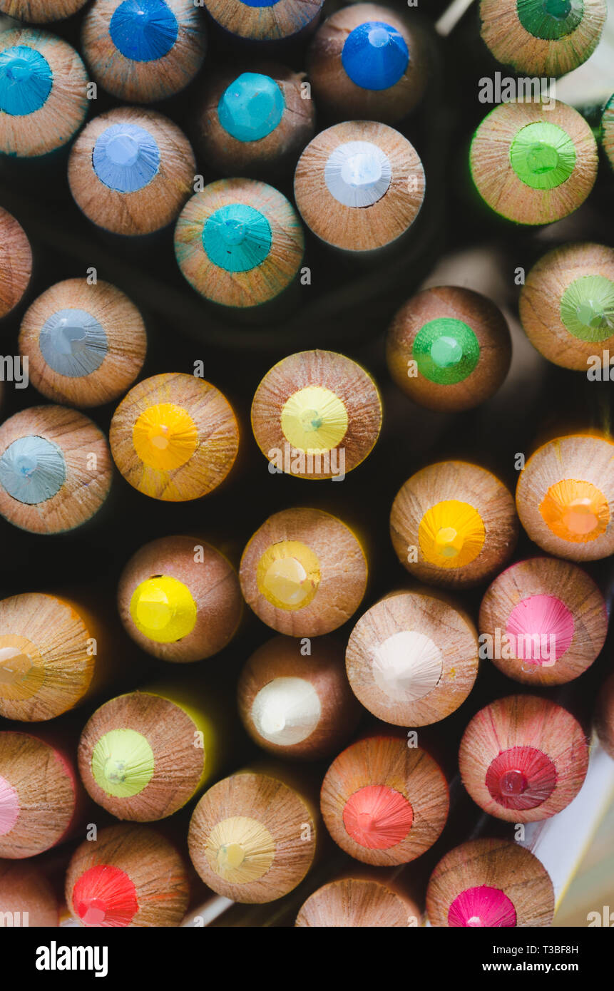 Background with wooden crayons Stock Photo - Alamy