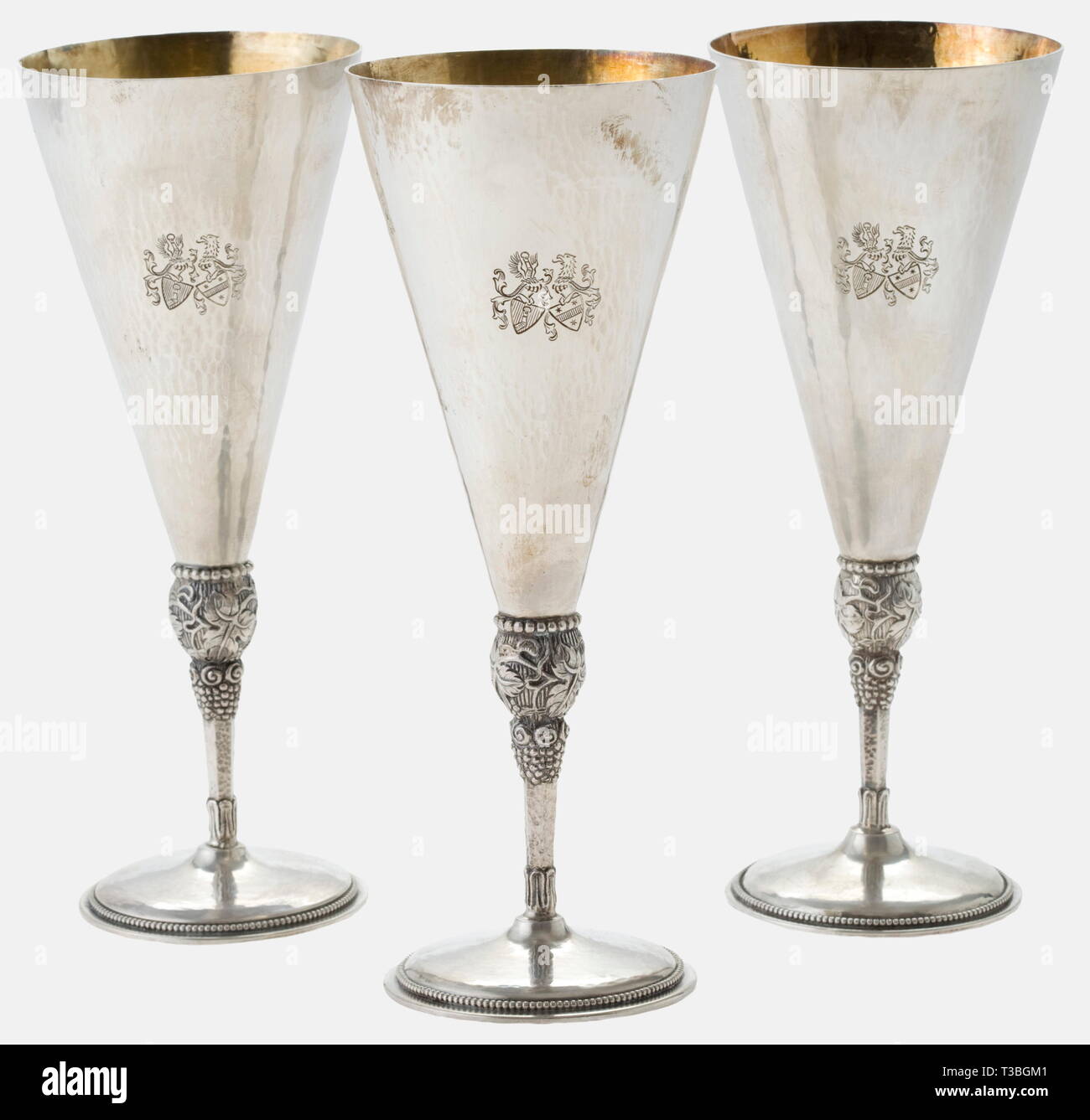Hermann Göring and Emmy Sonnemann, three silver goblets, wedding gifts for the couple 1935 See previous lot. Height of each goblet 18 cm, weight between 170 and 174 g. historic, historical, 1930s, 20th century, NS, National Socialism, Nazism, Third Reich, German Reich, Germany, German, National Socialist, Nazi, Nazi period, fascism, fine arts, art, art object, art objects, artful, precious, collectible, collector's item, collectibles, collector's items, rarity, rarities, drinking glass, drinking glasses, vessel, vessels, Editorial-Use-Only Stock Photo