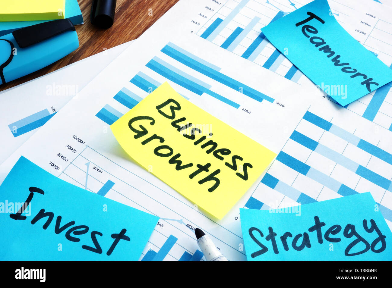 Business growth concept. Report and marks invest, teamwork and strategy. Stock Photo