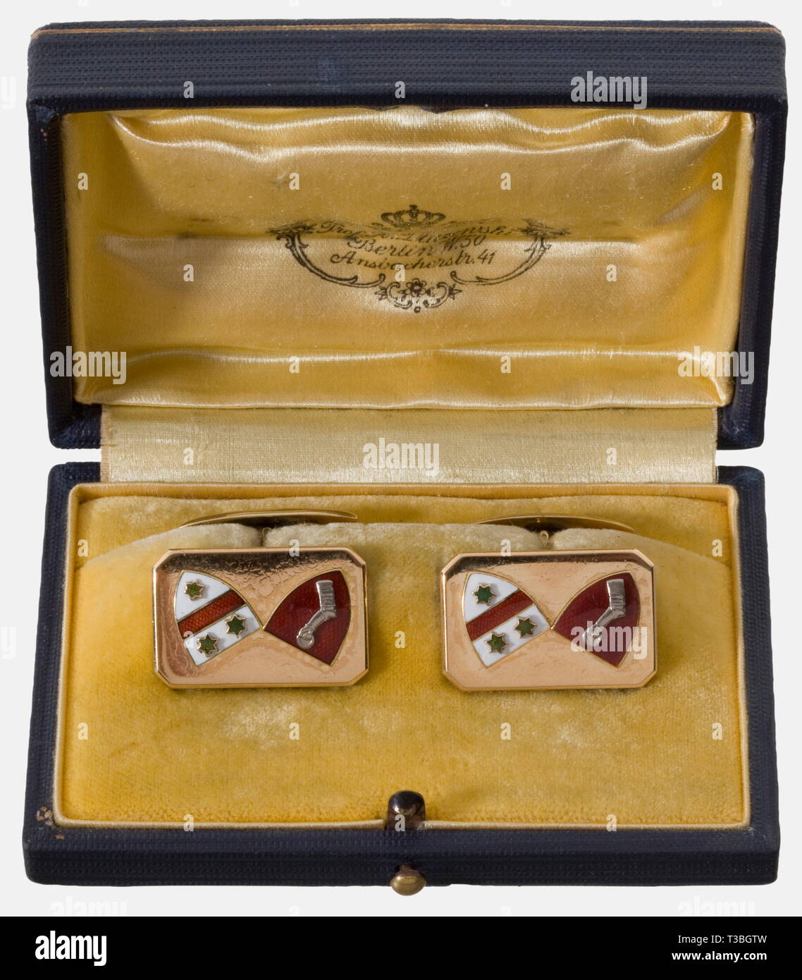 Hermann Göring, a pair of gold cufflinks Polychrome enamelled alliance coat of arms of Göring and Sonnemann riveted to a square gold plate with bevelled edges. Hallmark '925' on the connection pin. Weight 18.6 g. In the blue jeweller's case 'R. Tips Nachfahren - Prof. K. Dluzenski - Berlin W 50 Ansbacherstr. 41'. historic, historical, 1930s, 1930s, 20th century, NS, National Socialism, Nazism, Third Reich, German Reich, Germany, German, National Socialist, Nazi, Nazi period, fascism, object, objects, stills, clipping, clippings, cut out, cut-out, cut-outs, fine arts, art, a, Editorial-Use-Only Stock Photo