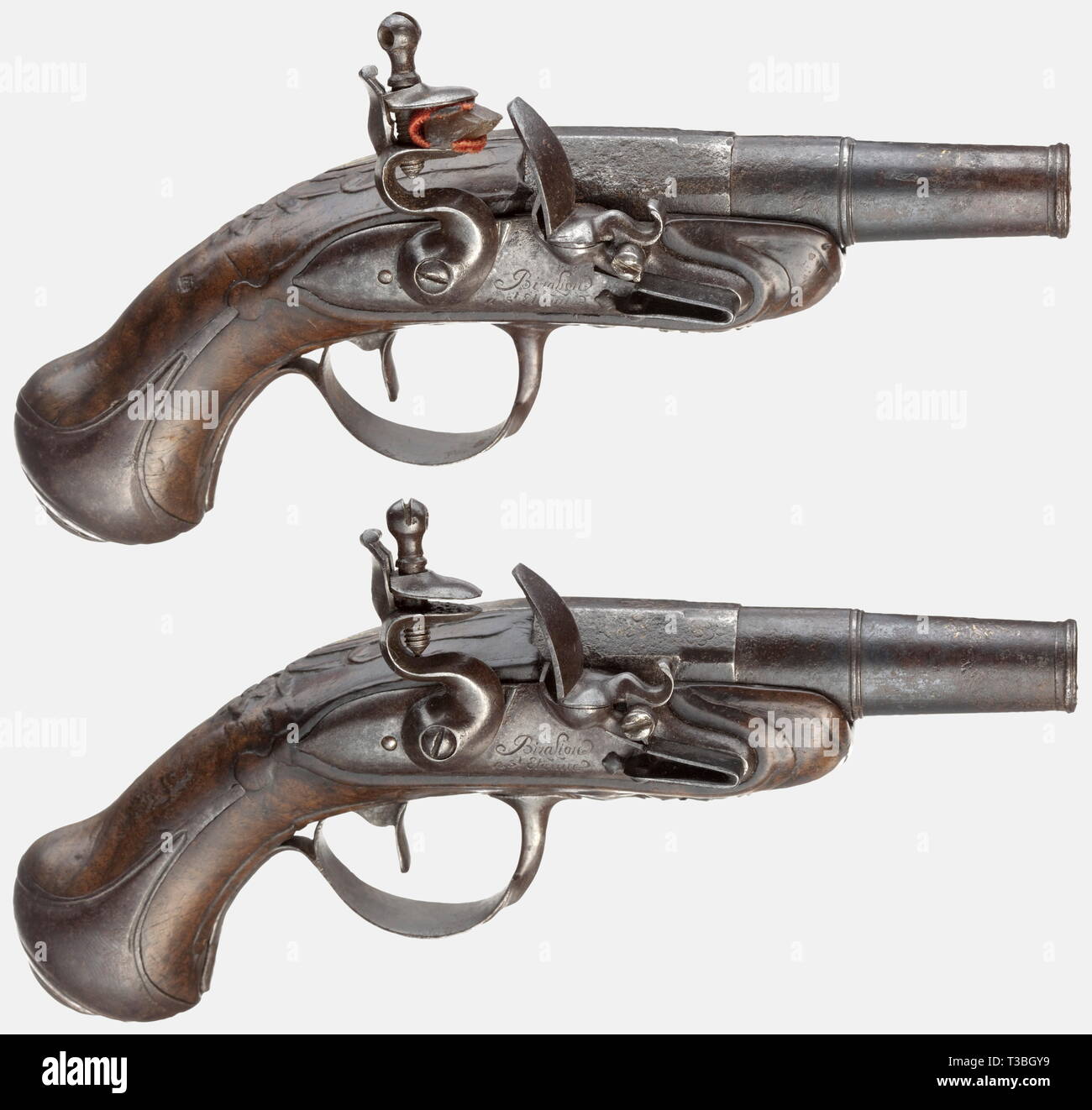A pair of flintlock traveler's pistols, Bizalion in St. Etienne, circa 1780. Round screw barrels with lugs, twelve-groove rifled bores in 10 mm calibre, engraved decoration on top of the barrels, and little remnants of bluing and gilding. Flintlocks with the engraved signature, 'Bizalion à St. Etienne'. Lightly carved walnut stocks with smooth, iron furniture. Length of each 17 cm. historic, historical, 18th century, civil handgun, civil handguns, handheld, gun, guns, firearm, fire arm, firearms, fire arms, weapons, arms, weapon, arm, object, obj, Additional-Rights-Clearance-Info-Not-Available Stock Photo