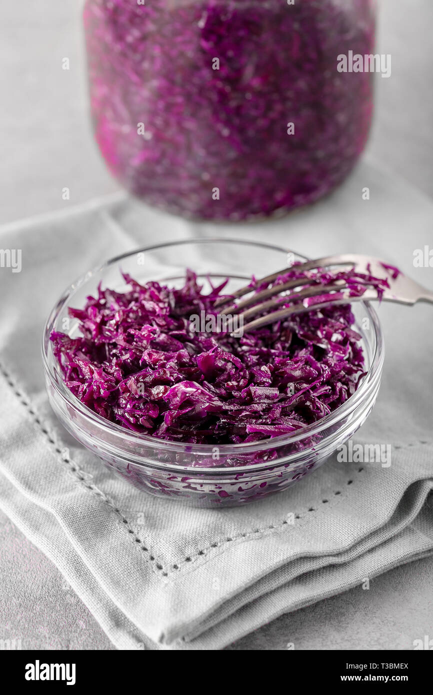 Homemade fermented cabbage. Vegan salad rustic style glass jar. Concept