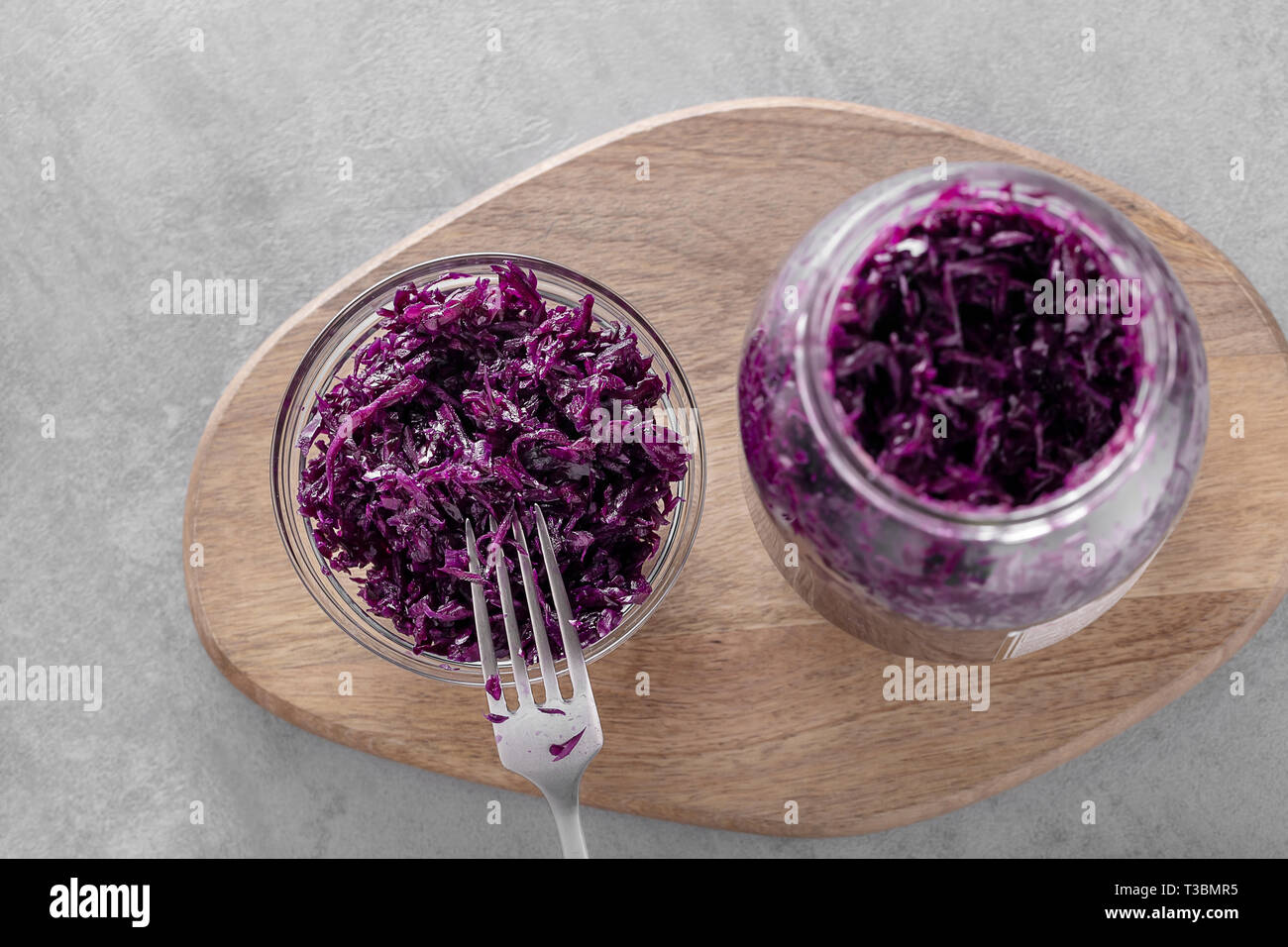 Homemade fermented cabbage. Vegan salad rustic style glass jar. Concept