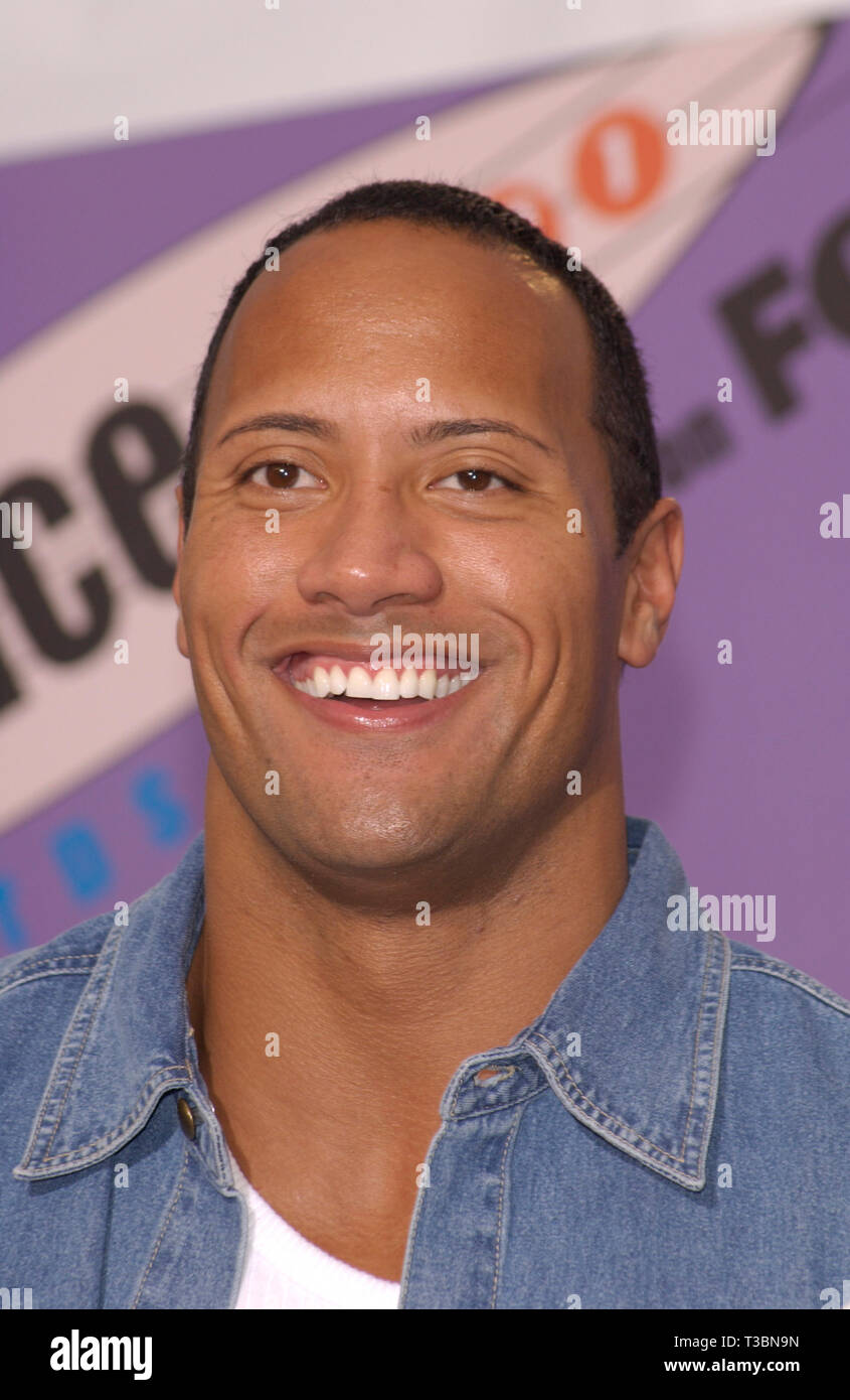 LOS ANGELES, CA. August 12, 2001: Actor DWAYNE JOHNSON, aka The Rock, at the 2001 Teen Choice Awards at the Universal Amphitheatre, Hollywood.  He won the award for Choice Sleazebag for his role in The Mummy Returns. © Paul Smith/Featureflash Stock Photo