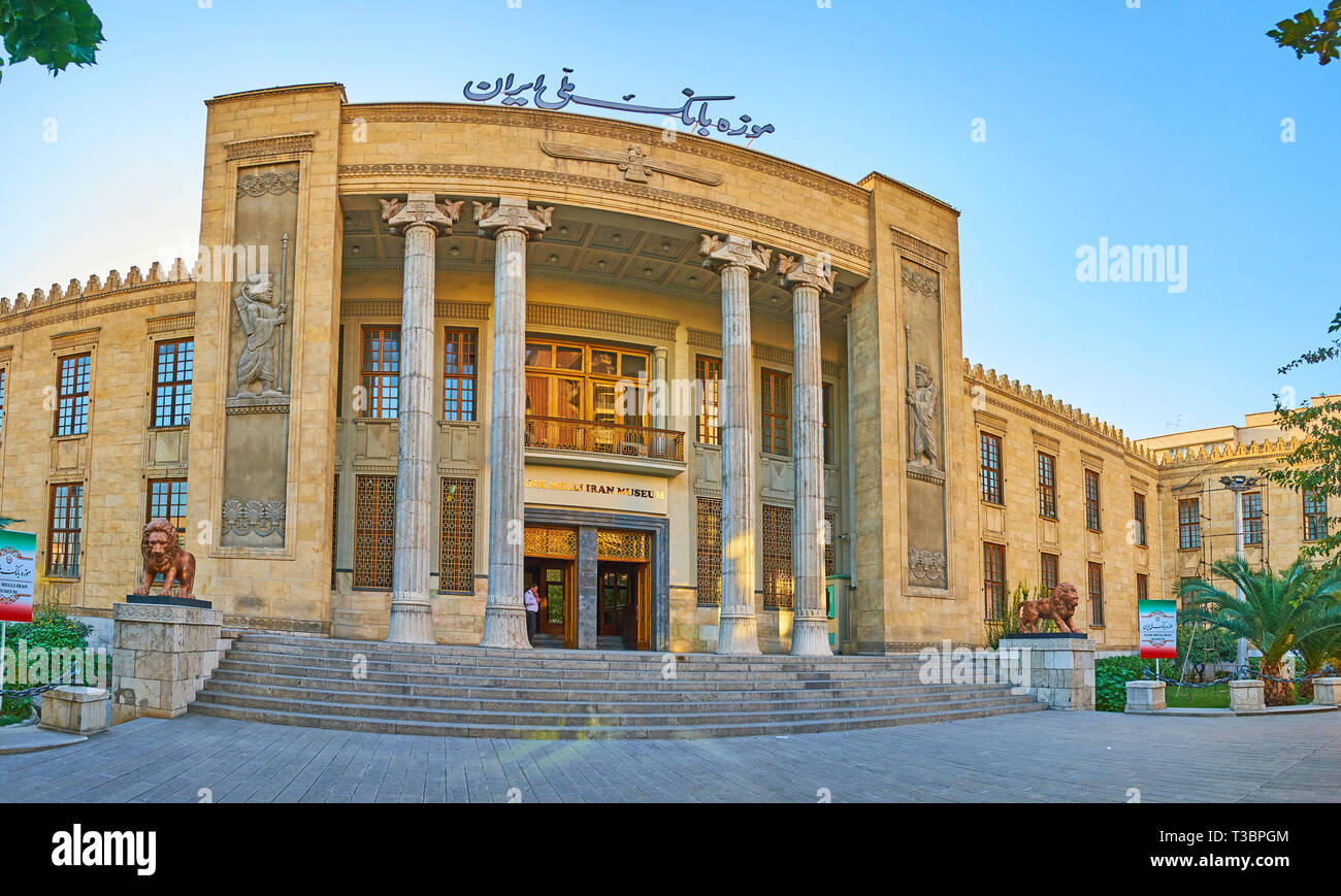 TEHRAN, IRAN - OCTOBER 25, 2017: The facade of Bank Melli International Grand Museum, decorated with Iranian columns and reliefs of ancient Persian wa Stock Photo