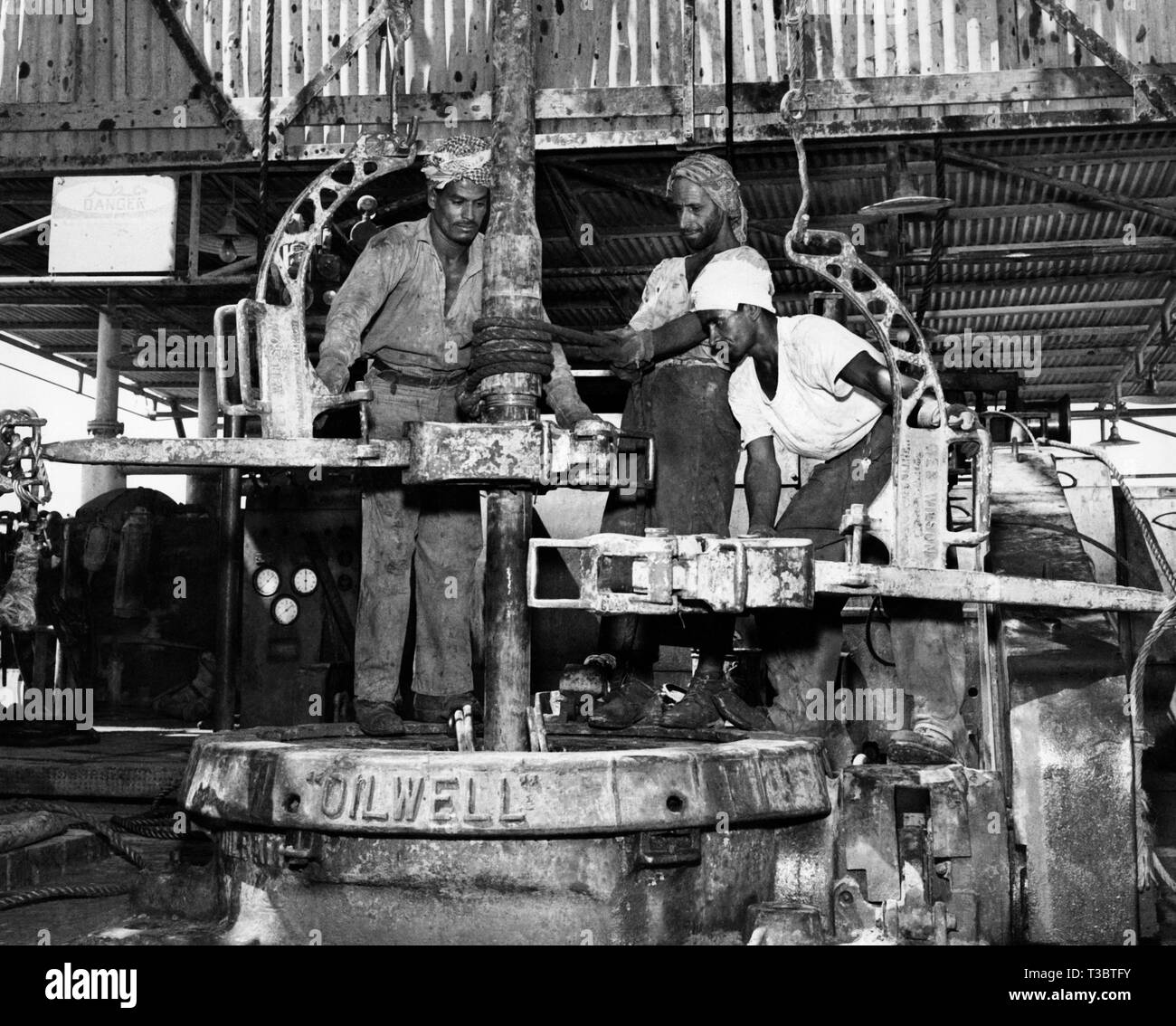 Saudi Arabia, workers at the oil well, 1952 Stock Photo