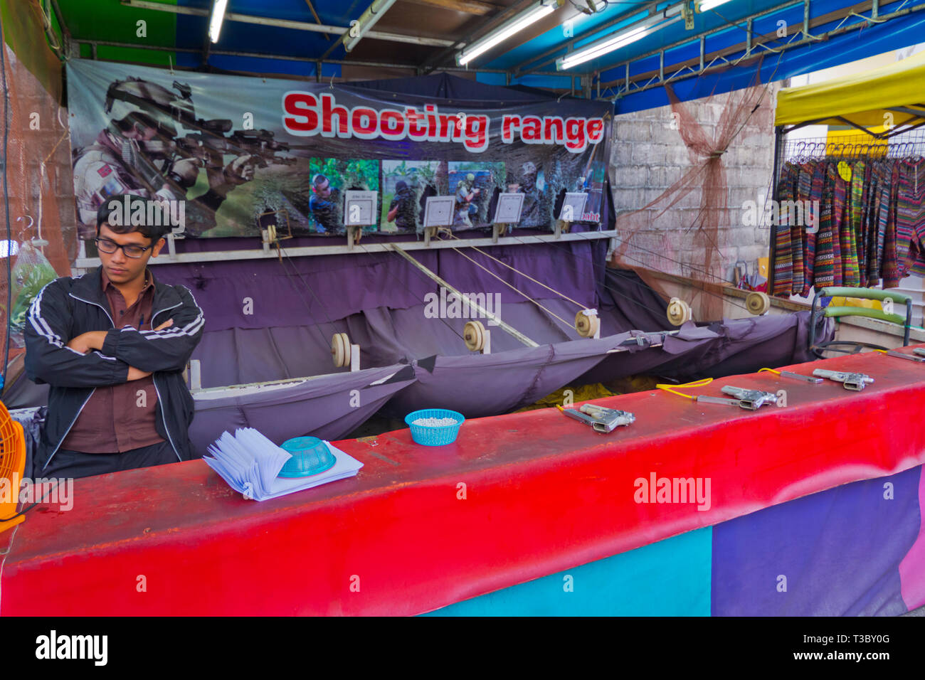 Shooting range, Night Market, Walking Street, Krabi town, Thailand Stock Photo