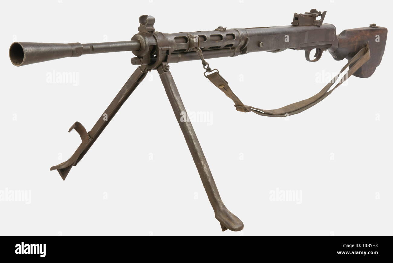 A Soviet light machine gun Degtyarev (DP 28), calibre 7,62 x 54R, made in 1943,. serial number TB135. Pitted, no more bluing, no magazine. With a leather sling of another model. historic, historical, 1930s, 20th century, gun, guns, firearm, fire arm, firearms, fire arms, weapons, arms, weapon, arm, fighting device, object, objects, stills, clipping, clippings, cut out, cut-out, cut-outs, military, militaria, piece of equipment, No-Exclusive-Use | Editorial-Use-Only Stock Photo