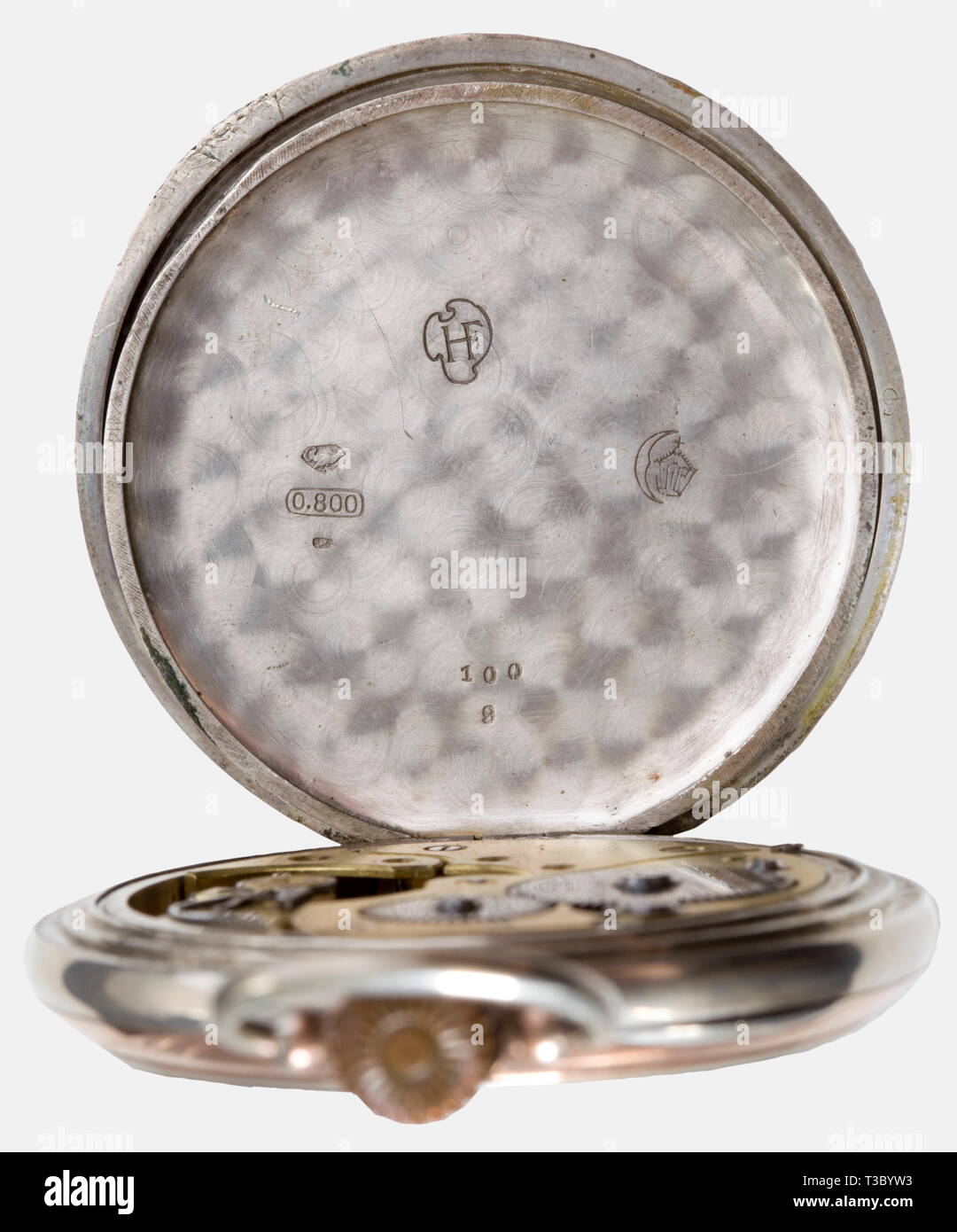 Kaiser Wilhelm II - Johann Adam, a presentation pocket watch Silver case, partially gilded. The lid bears the Imperial cipher 'W'. The dust cap displays a wreathed and crowned of Wilhelm II and the dedication inscription, 'Für 25 Jährige treue Dienste in der Königlichen Pulverfabrik bei Hanau 1915 Dem Betriebsleiter Johann Adam I'. (To the Managing Director Johann Adam I For 25 years of Loyal Service at the Royal Powder Factory at Hanau 1915). Enamelled dial. Simple blued lancet hands. Separate second dial. Manufacturer's mark, 'HF'. Movement not, Additional-Rights-Clearance-Info-Not-Available Stock Photo