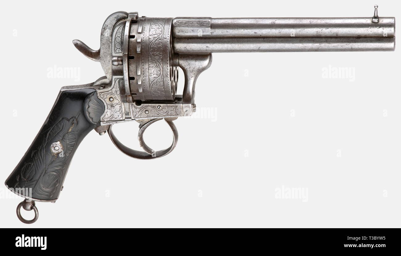 An 18-shot pin-fire revolver, Liège, circa 1860. 9 mm Lefaucheux calibre. No. 1462. Two over-and-under barrels. 18-shot cylinder with a six-shot inner circle and a twelve shot outer circle of chambers. ELG proof mark. Frame and cylinder bear finely engraved vine decoration. Lightly carved grip panels of ebonised wood. Half of the right grip panel has been replaced. Pommel has a lanyard ring and a cartridge case ejector which screws out. Length 28 cm. Rare system, which alternately fired from the two circles of cartridges. Erwerbsscheinpflichtig. , Additional-Rights-Clearance-Info-Not-Available Stock Photo
