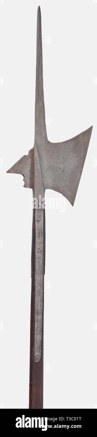 A German halberd, mid-16th century Heavy reinforced spike of quadrangular section. Heavy blade with a straight edge and a strong fluke on the rear. A blossom mark stamped on one side. Faceted socket with four wide side straps. Original ash shaft (shortened), with light worm damage in places. Length 202 cm. historic, historical, 16th century, pole weapon, weapons, arms, weapon, arm, fighting device, military, militaria, object, objects, stills, clipping, clippings, cut out, cut-out, cut-outs, metal, Additional-Rights-Clearance-Info-Not-Available Stock Photo